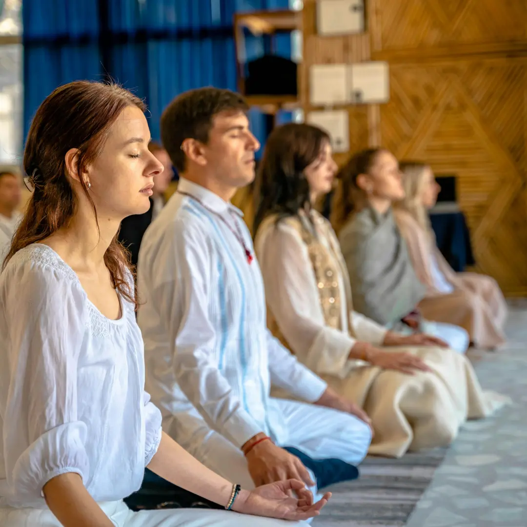 Participants seated in meditation