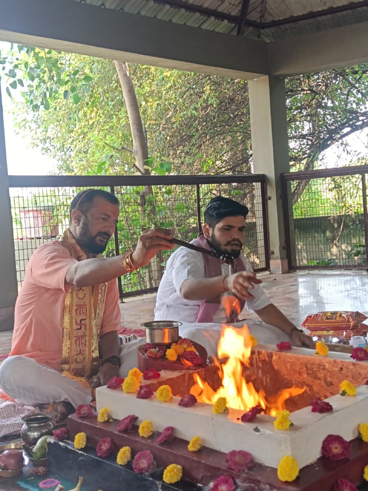 The fire rising as offerings are made